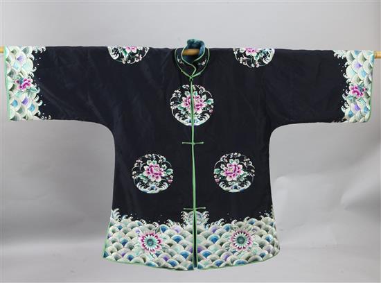 A Chinese black silk satin womans jacket, 1920s, length 81cm